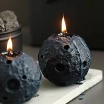 Black ball shaped scented candle